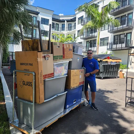 Movers loading furniture into a rental truck